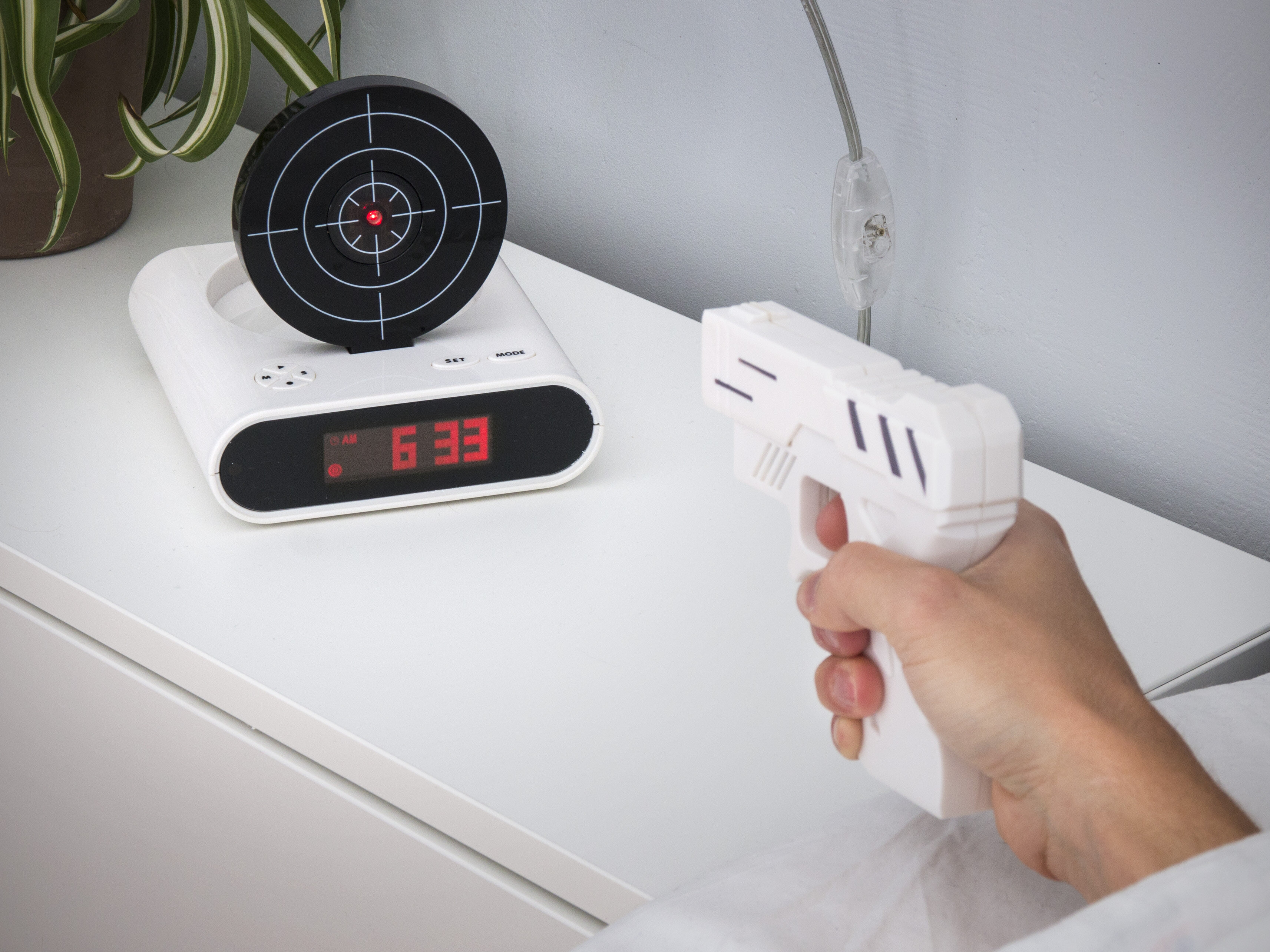 Gun alarm clock